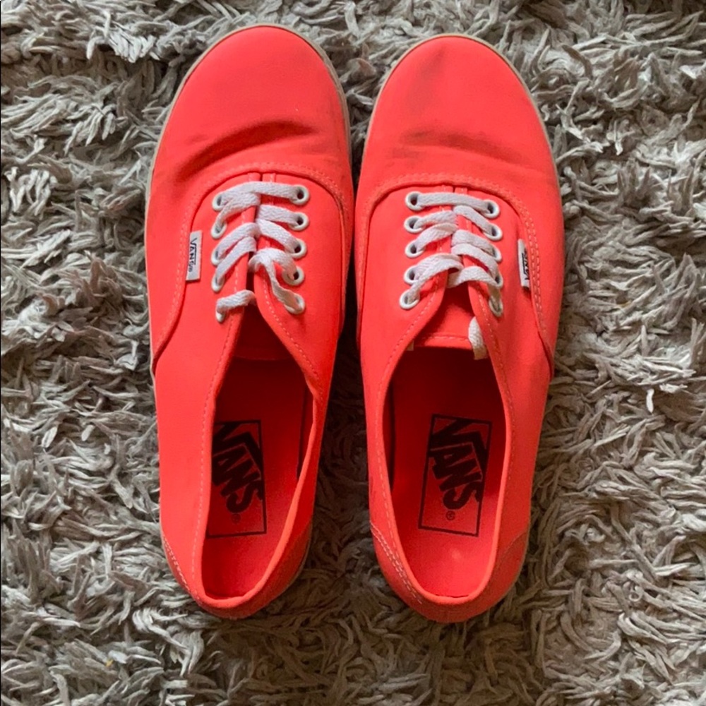 neon pink/salmon colored vans.